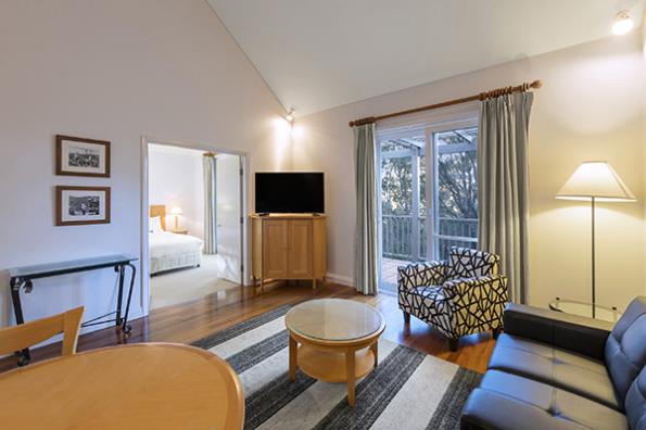 Oaks Cypress Lakes Resort 1 Bedroom Villa Living 600x400px.jpg